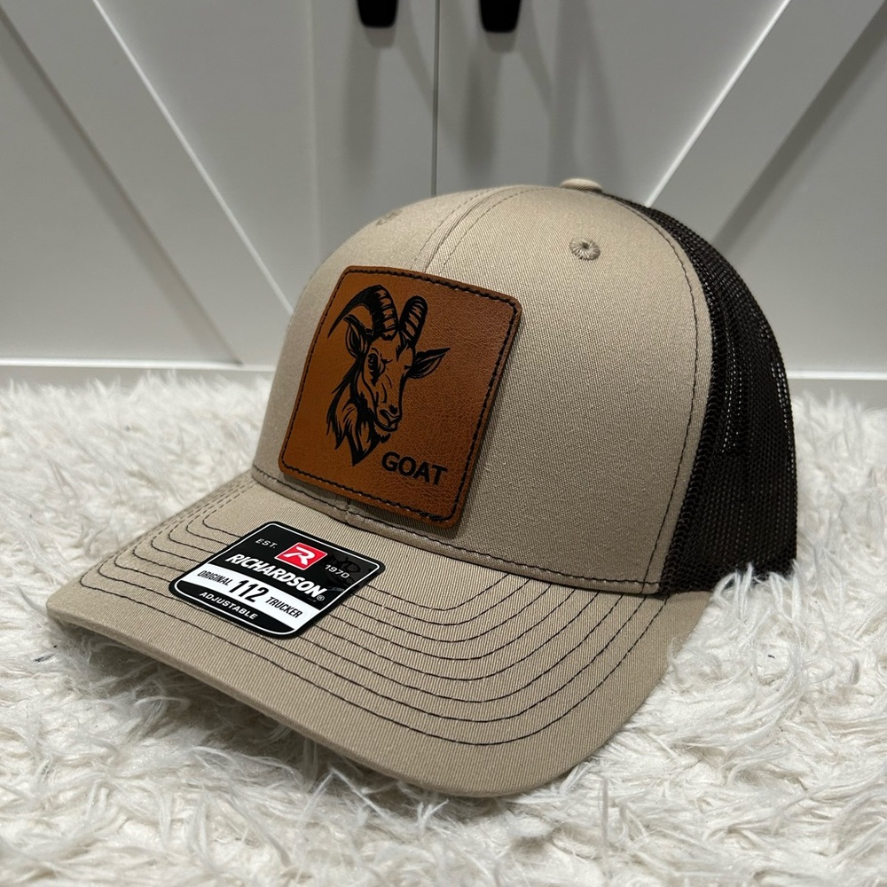 Laser engraved GOAT Richardson 112 trucker hat.